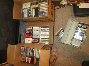 Large collection of music cassette tapes from a variety of artists across various genres