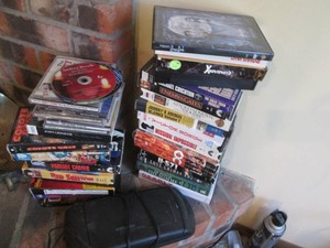 Vintage VHS movies and cddvds with VHS tape rewinder