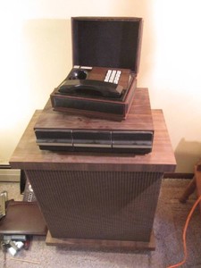Pair of large vintage stereo speakers, deco-tel personal telephone and 3-drawer tape cassette storage organizer