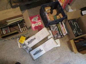 Collection of vintage books on Parks, forests, natural disaster, solar system and misc office supplies