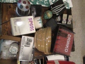 Stoneware planters, drinko-game, misc speakers, shoe polish supplies and other misc shown