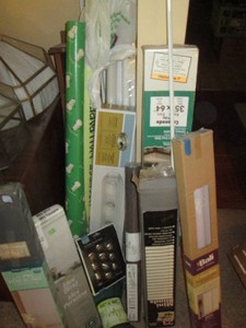 Corner lot of vinyl mini-blinds, drawer hardware, wrapping paper, shelf, light fixture and bulbs