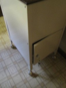 Vintage rolling flip top file cabinet with locking lower storage compartment