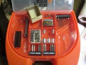 Vintage lighter with Black and Decker household tool kit and misc door hardware