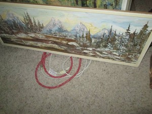 Framed mountain landscape painting on canvas
