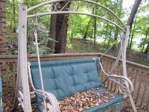 Freestanding Decorative tubular metal framed outdoor bench swing