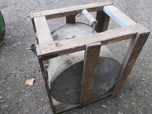 Vintage galvanized metal rocker can with protective wood frame