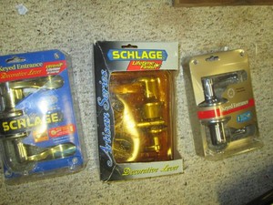 Collection of assorted door levers and hardware