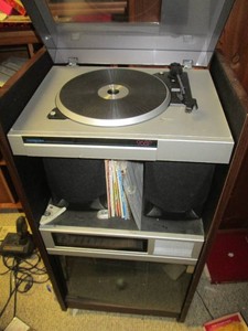 Vintage Soundesign rolling stereo cabinet with turn table, speakers, tape cassette storage and album storage