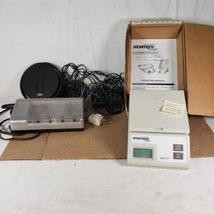 Stamps.com Electronic Postal Scale, Energizer Charger, and Terk Antenna.