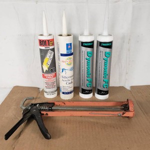 White Lightning Adhesive Caulk, Sherwin-Williams Siliconized Acrylic Latex Caulk, Tremco Dymonic FC Sealant, and Caulking Gun