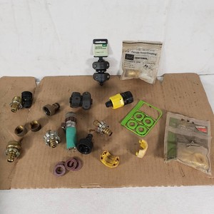 Lot of garden hose accessories including Craftsman 12 Female Hose Coupling, Nelson Vinyl Hose Washers, clamps, and connectors