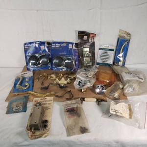 Lot of Hardware and Door Accessories including Andersen Patio Door Auxiliary Lock, Brass Hooks, and Twin Wheel Casters