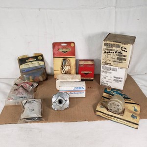 Lot of Briggs & Stratton and Tecumseh Small Engine Parts including Rope Starter, Clutch Starter, Carburetor and Muffler