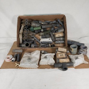 Lot of plumbing fittings including Lasco and Mills Fleet Farm adapters and tees