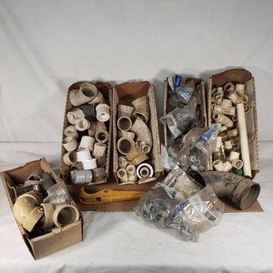 Lot of Plumbing Fixtures and Fittings including Stop & Waste Valve, PVC Fittings, and Pipe Cutter