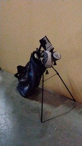 Black and Blue golf bag with clubs