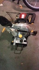 Yellow corded motor saw