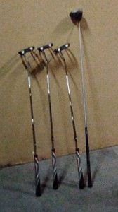 3 putters and 1 driver