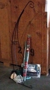 cast iron decoration and assortment of garage items