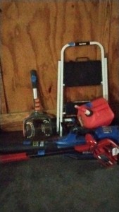 assortment of yard tools and garage items
