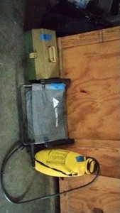 tackle box, Ozark trail chair, yellow spray can