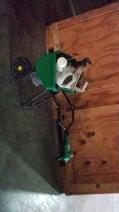 water can, Scotts Wizz inside a vigoro lawn push cart