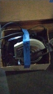 open box of saws and sanders