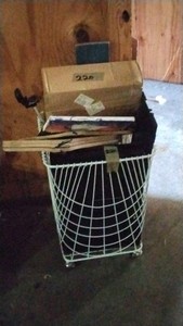 laundry basket of pictures clothes hangers