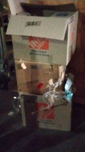 3 boxes of cat litter, pictures, books, shoes