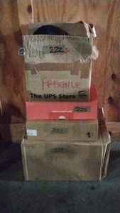 4 boxes of decorations, shoes, kitchen bowls