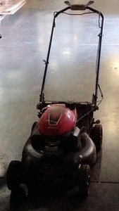 red Honda lawn mower