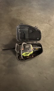 chainsaw in black case