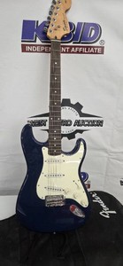Squier electric guitar and bag