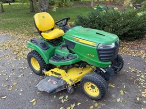 John Deere X738 AWD Garden Tractor with 54-inch Mower Deck, Snow Blade & Quick Hitch