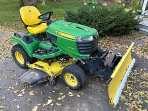 John Deere X738 AWD Garden Tractor with 54-inch Mower Deck, Snow Blade & Quick Hitch