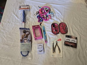 Lot of Health and Beauty Accessories Including Kiss Magnetic Lashes, Nail Care Sets, and Decorative Keychains