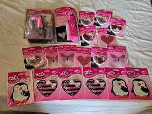 Tulip Crafting Tools and Decorations Lot including Mini Fashion Iron, Cordless Crystal Setting Tool, Iron-On Appliques, Glass Crystals, and Fashion Designs
