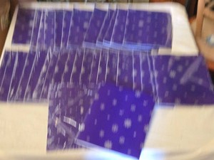 Precut sheets of wrapping paper with Snowflake Design