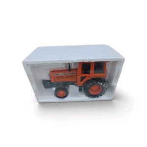 is a Yonezawa Diapet 120 Scale Kubota M-Series Diecast Tractor (Model T-108)
