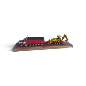 red semi-truck and trailer model set mounted on a display base.Tractor Red Peterbilt 389 day cab with chrome accents. Trailer Red tri-axle dump trailer (such as a Mac dump style) with a black cover. Scale Typically 164 scale for DCP (First Gear