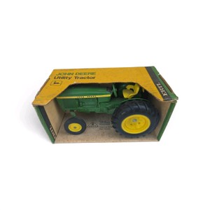 vintage 116 scale Ertl John Deere Utility Tractor (such as model #516 or a Blueprint Replica representing models like the John Deere 2030 or 2040) inside its original yellow and green display box