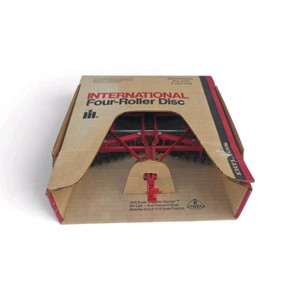 vintage 116 scale ERTL International Four-Roller Disc (Stock #494) toy farm implement in its original box.