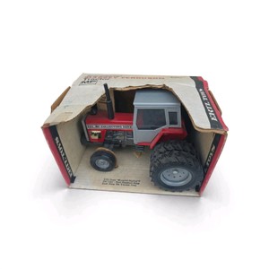 vintage 120 scale Ertl Massey Ferguson 690 die-cast toy tractor in its original packaging
