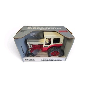 New in Box 116 scale ERTL International Harvester 1066 5 Millionth Special Edition Tractor (Stock No. 4620), featuring a white and red color scheme with an enclosed cab. Valued at $165