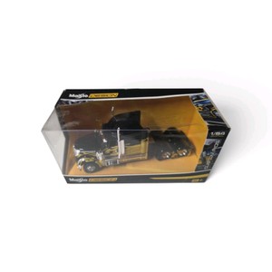 New in Box  Maisto 164 Scale Design Custom Rigs die-cast model of an International Lonestar semi-truck in black and yellow with flames