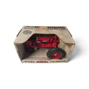 New in Box Valued at $60  116 scale ERTL McCormick-Deering Farmall F-20 die-cast metal toy tractor inside its original cardboard box
