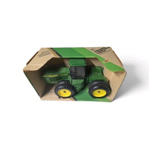 New in Box ERTL 116 scale John Deere 8760 4-Wheel Drive Articulating Tractor inside its original collectors box.