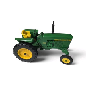 Green and yellow die-cast metal Ertl 116 scale John Deere utility tractor replica, featuring a wide front axle, black rubber tires with yellow rims, and a yellow seat
