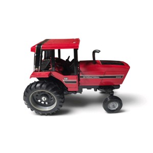 Red and black 116 scale International Harvester 5088 toy tractor made by Ertl.